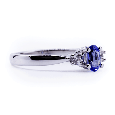 Oval Natural Tanzanite with Diamond Side Stones Ring
