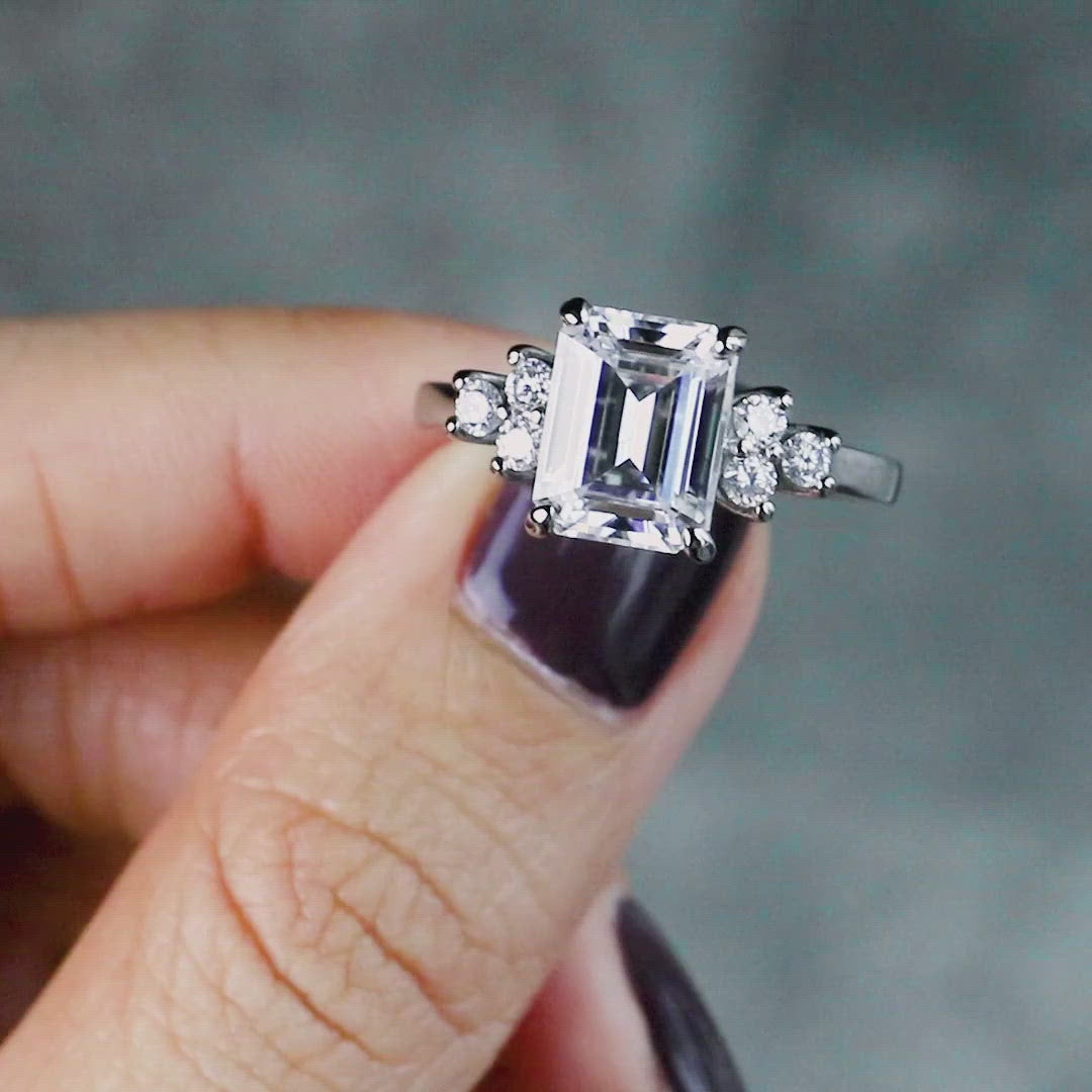 Nirvana Emerald Moissanite Multi Diamond Side Engagement Ring