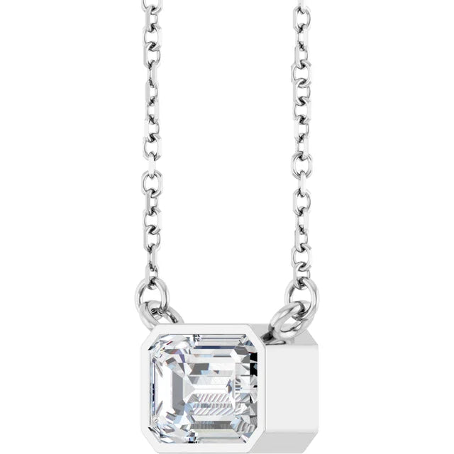 Emerald Center East West Bezel Set Pendant and Necklace