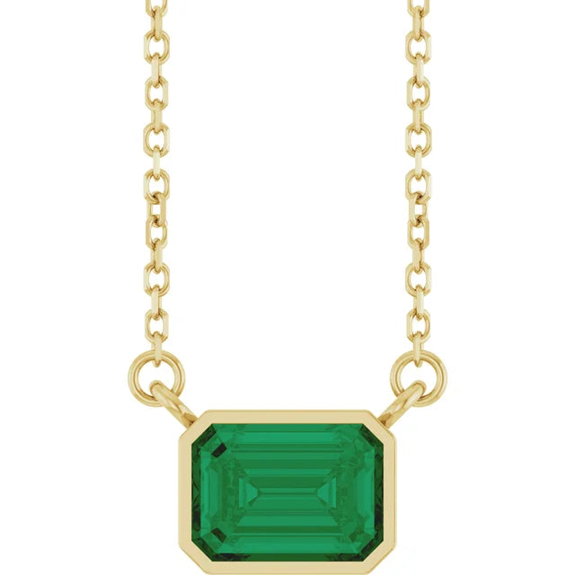 Emerald Center East West Bezel Set Pendant and Necklace