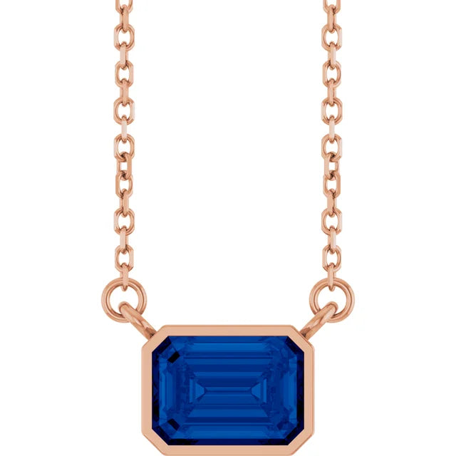 Emerald Center East West Bezel Set Pendant and Necklace