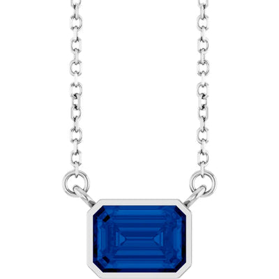 Emerald Center East West Bezel Set Pendant and Necklace