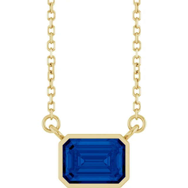 Emerald Center East West Bezel Set Pendant and Necklace