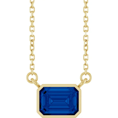 Emerald Center East West Bezel Set Pendant and Necklace