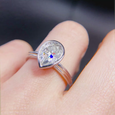 Fenestra Pear Moissanite Bezel Half-Round Edge Shank Engagement Ring