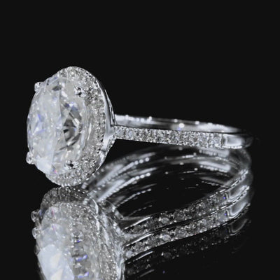 9x7mm First Crush Oval Moissanite 14K White Gold Halo Diamond Ring