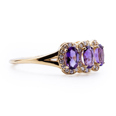 Oval Amethyst Three Stone Ring with Diamond Accented Halo on Split Shank Ring