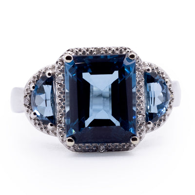 Three London Blue Topaz Stone Ring with Half Moon Side Stones and Diamond Accented Halo